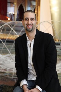 Cosmetic dentist Dr. Jay sitting in downtown Los Angeles